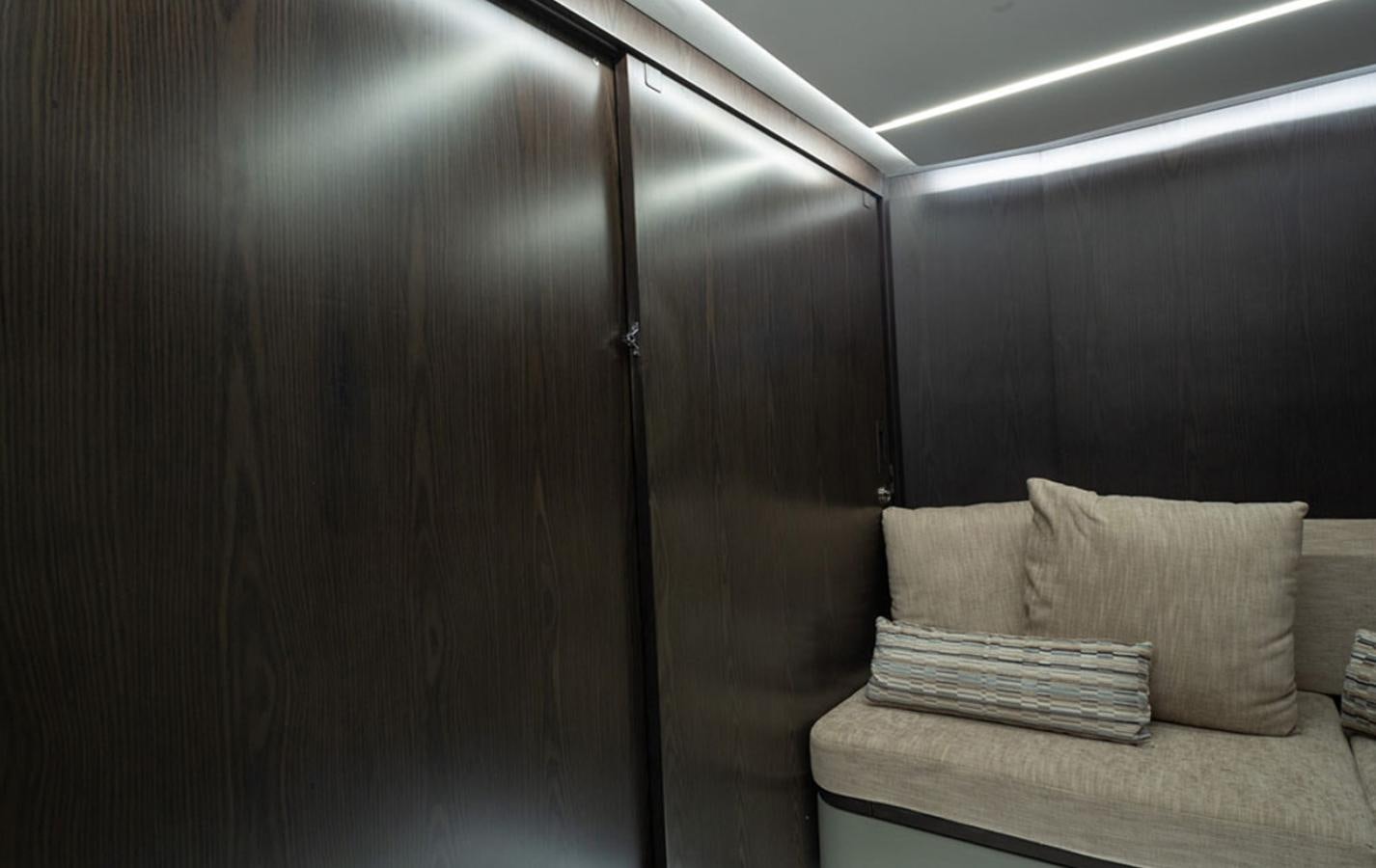 a bed in a room aboard OKEAN 80/01 Yacht for Sale