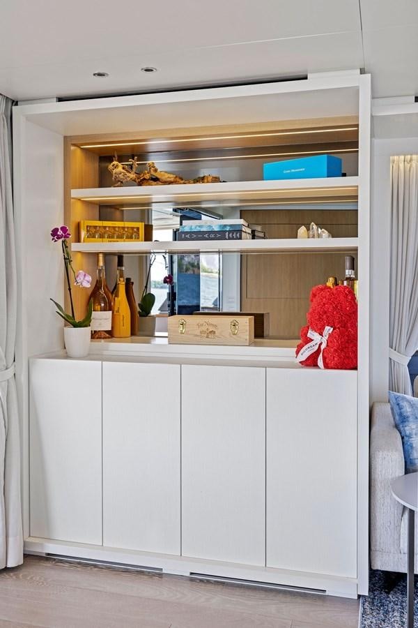 a white cabinet with shelves aboard DON'T TELL MOM Yacht for Sale