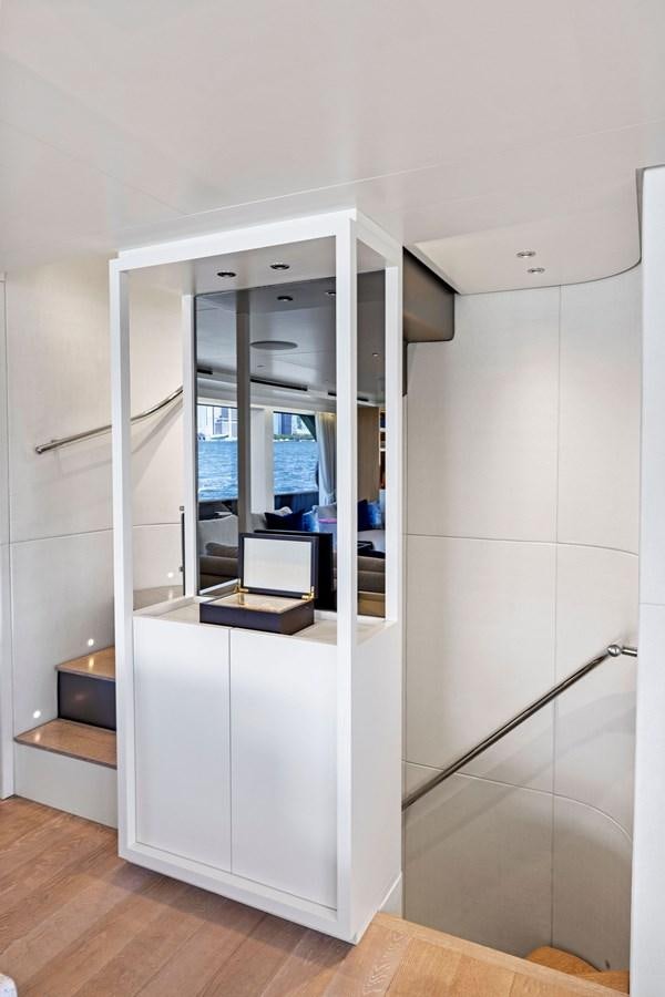 a white cabinet with a glass door aboard DON'T TELL MOM Yacht for Sale