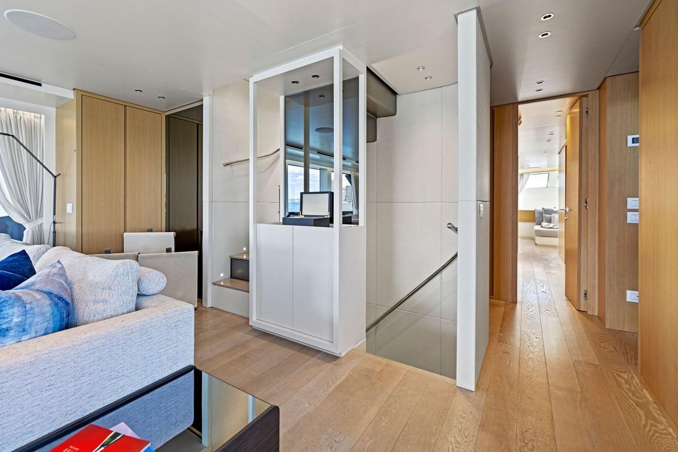 a room with a bed and a door aboard DON'T TELL MOM Yacht for Sale