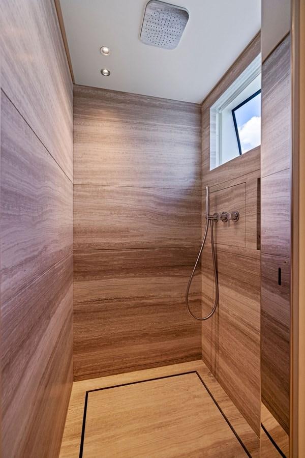 a wooden wall with a light fixture aboard DON'T TELL MOM Yacht for Sale