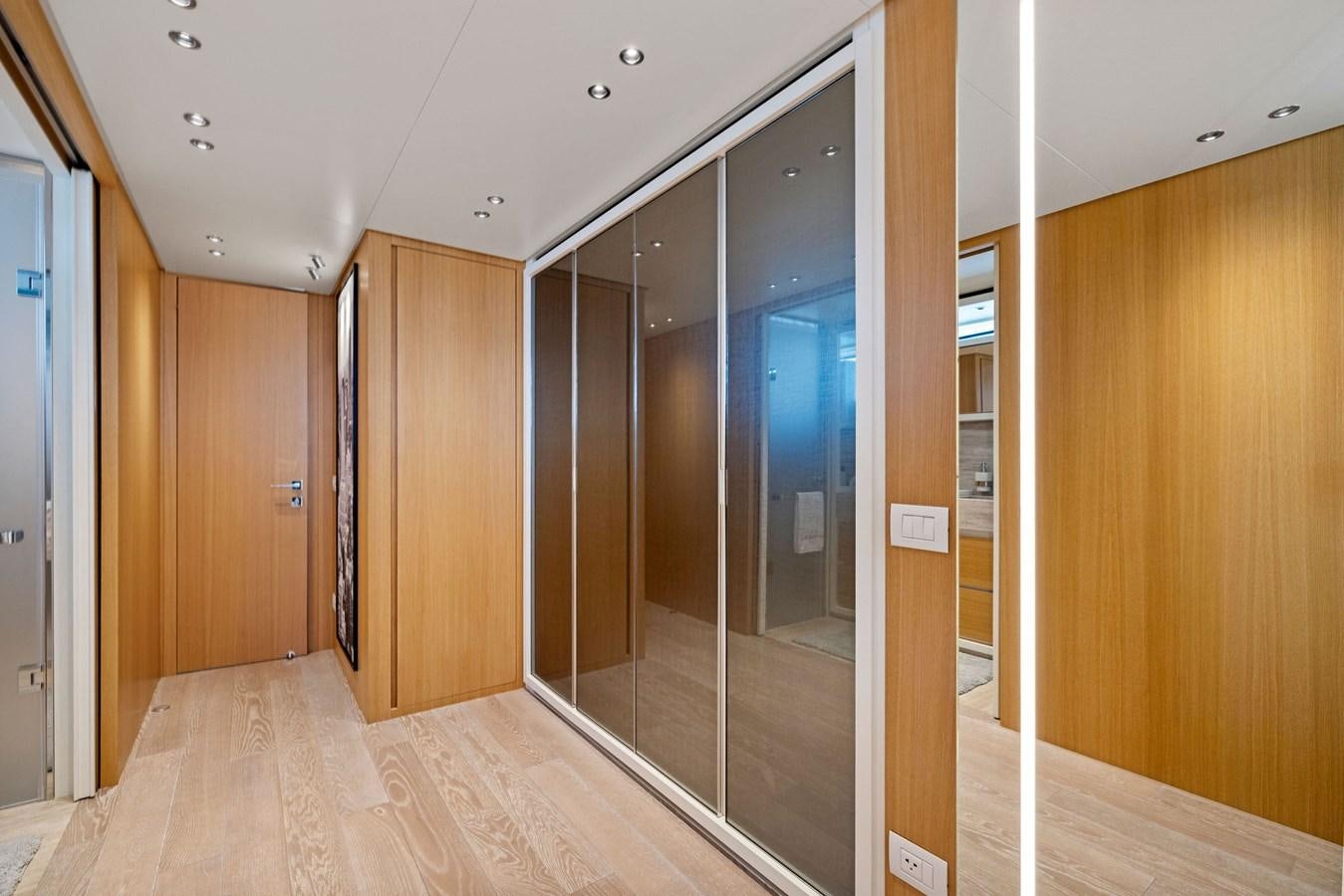 a hallway with a glass door aboard DON'T TELL MOM Yacht for Sale