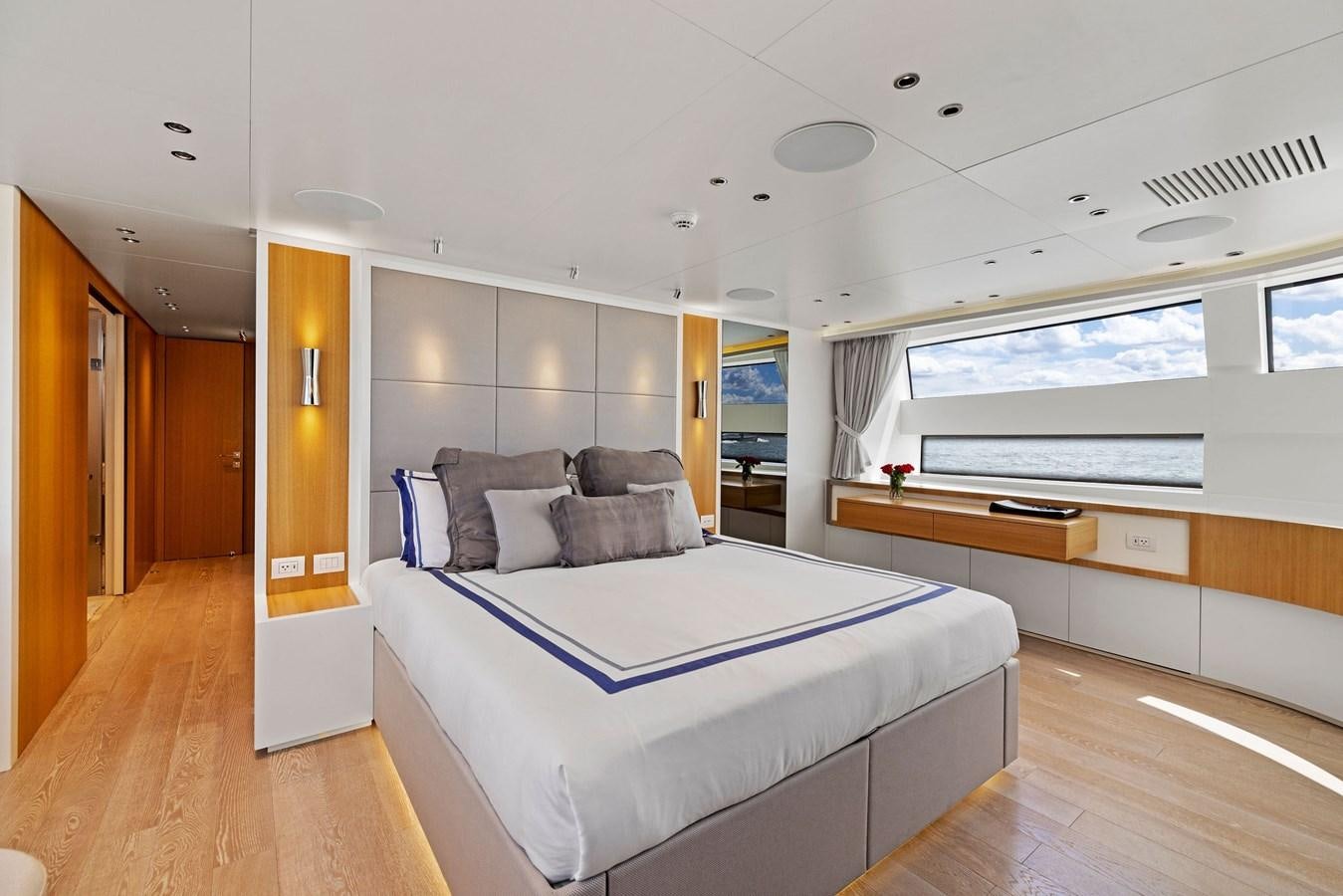 a bedroom with a bed aboard DON'T TELL MOM Yacht for Sale