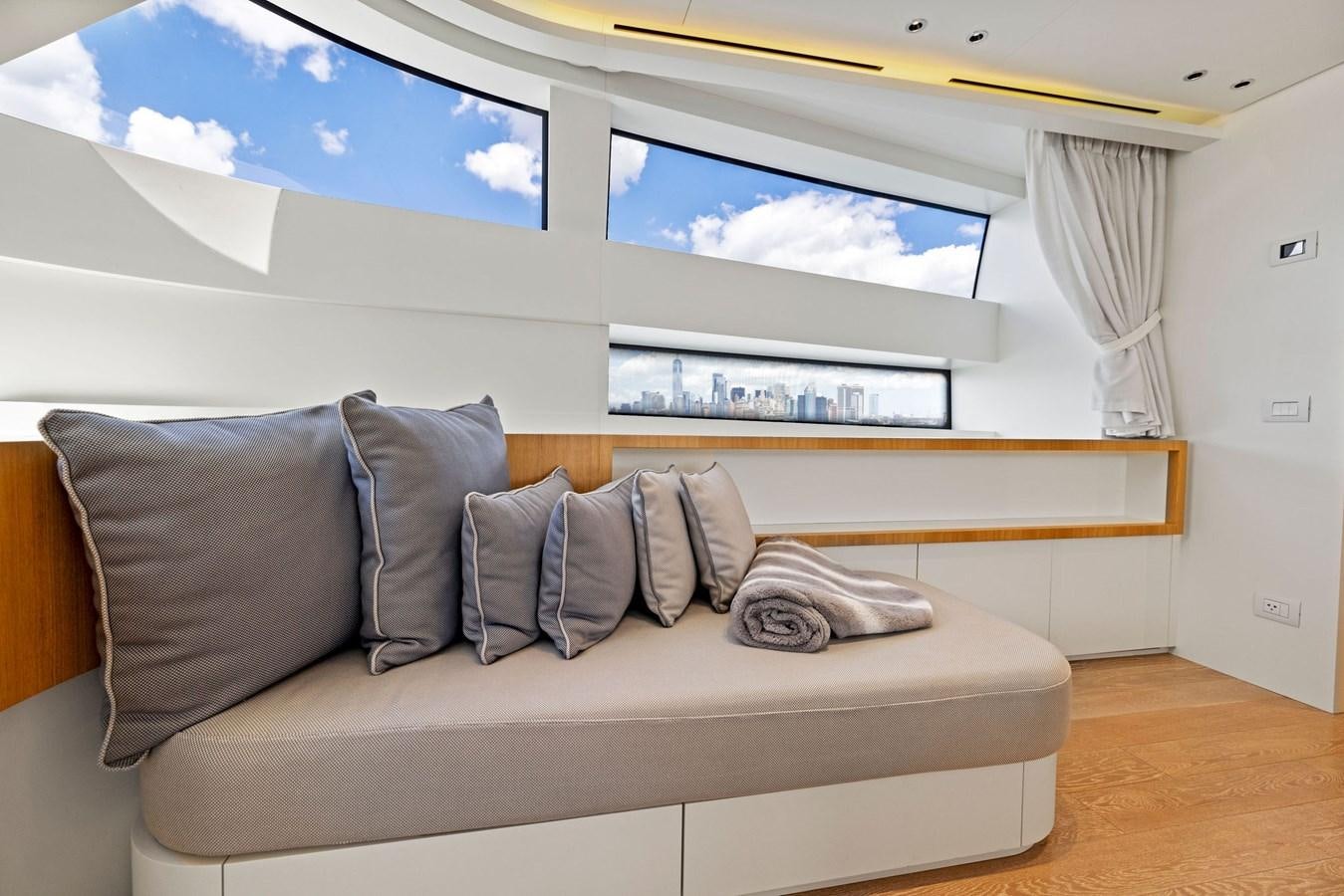 a couch in a room aboard DON'T TELL MOM Yacht for Sale