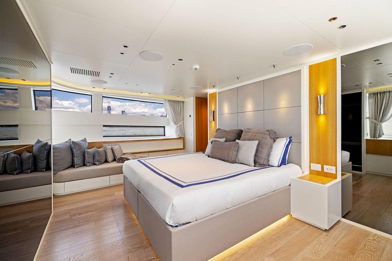 a large bedroom with a bed aboard DON'T TELL MOM Yacht for Sale