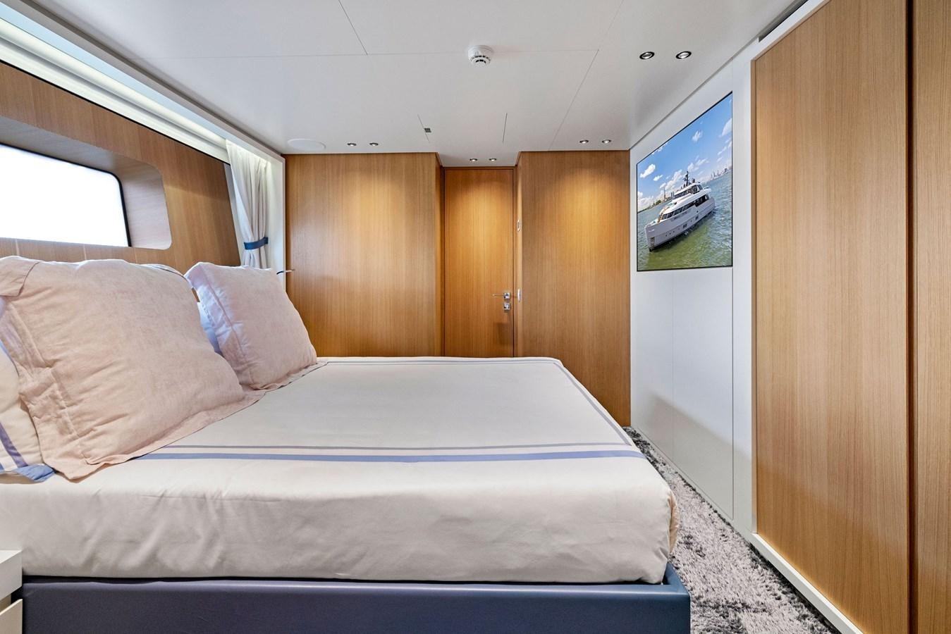 a bed in a room aboard DON'T TELL MOM Yacht for Sale