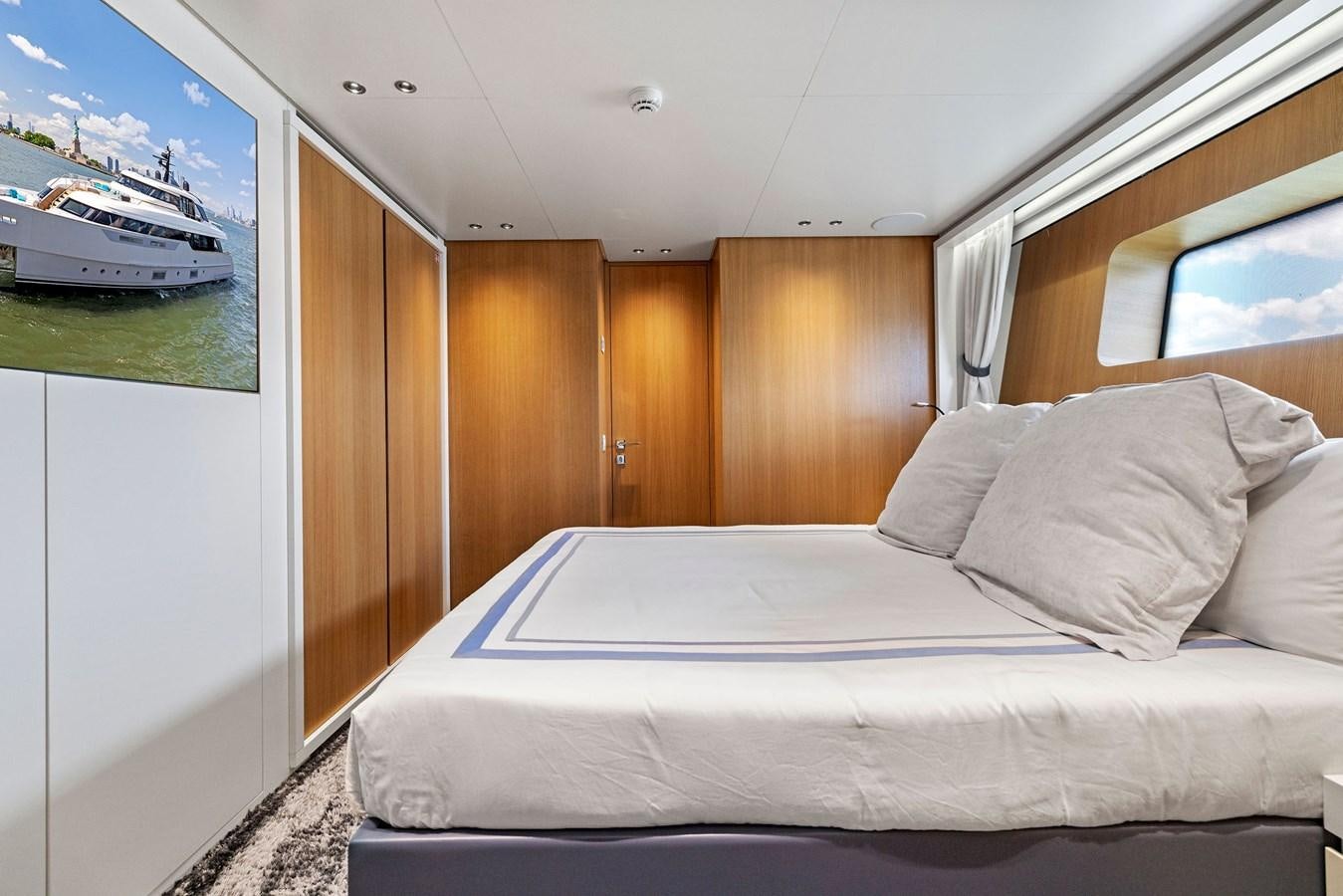 a bed in a room aboard DON'T TELL MOM Yacht for Sale