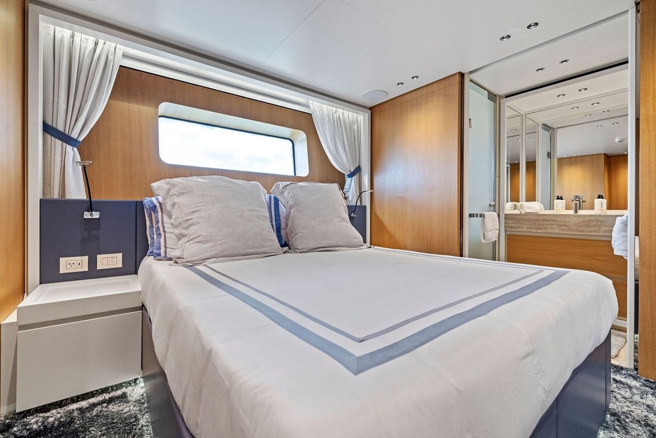 a bed in a room aboard DON'T TELL MOM Yacht for Sale