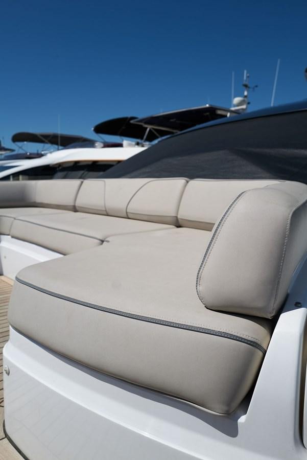 the front of a white car aboard PRINCESS M Yacht for Sale