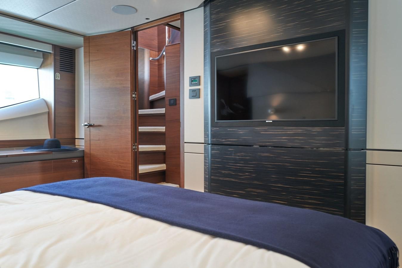 a bed in a room aboard PRINCESS M Yacht for Sale