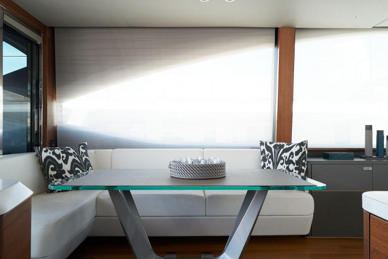 a table with a basket on it aboard PRINCESS M Yacht for Sale