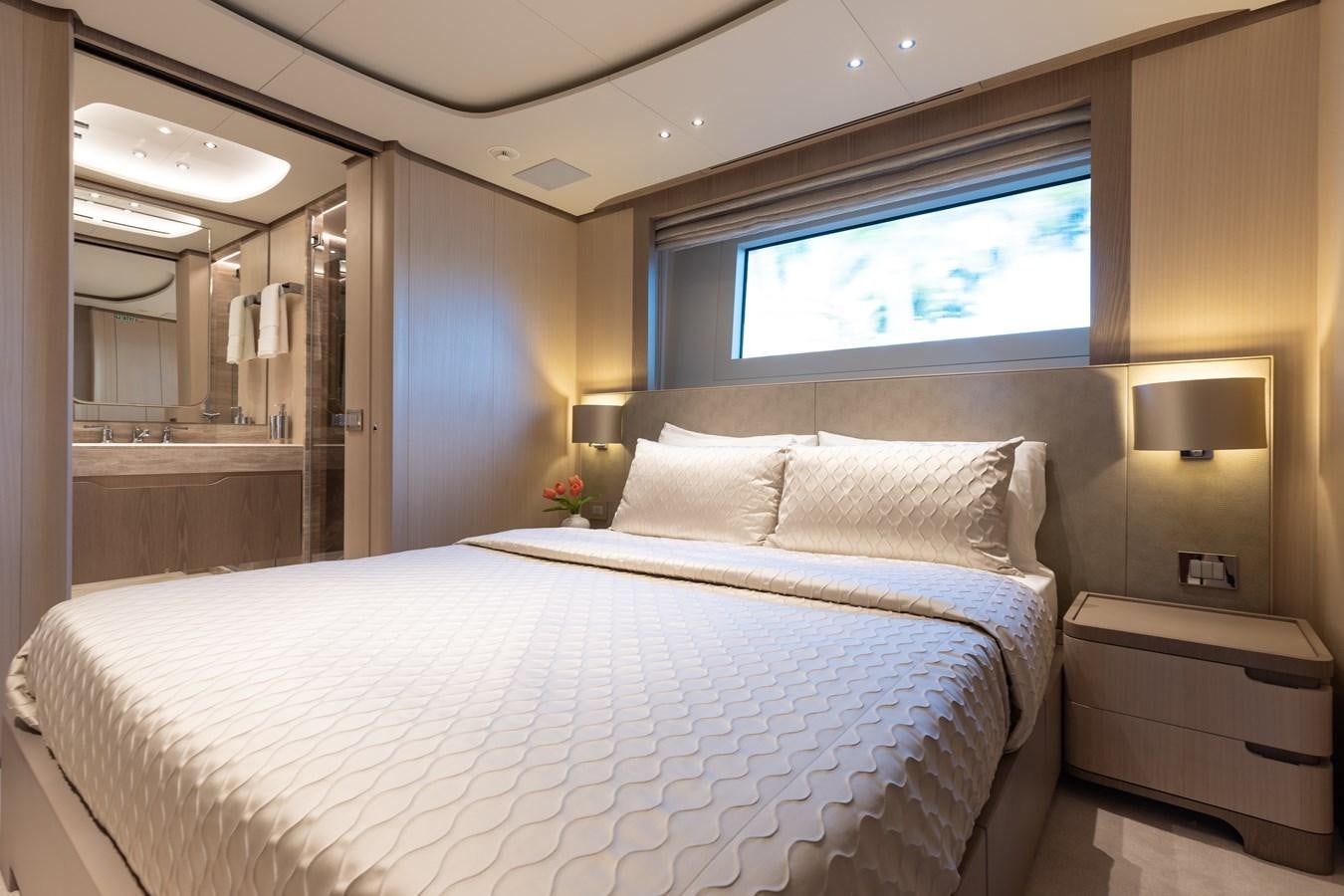 a hotel room with a bed aboard ABBENTURES III Yacht for Sale