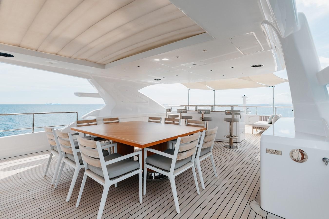 a table and chairs on a boat aboard ABBENTURES III Yacht for Sale