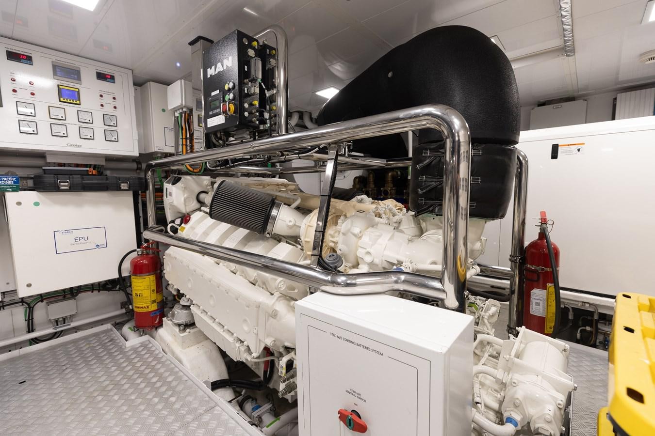 a machine with a large black object on the side aboard ABBENTURES III Yacht for Sale