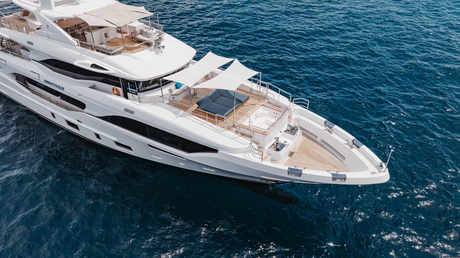 a large white boat in the water aboard ABBENTURES III Yacht for Sale