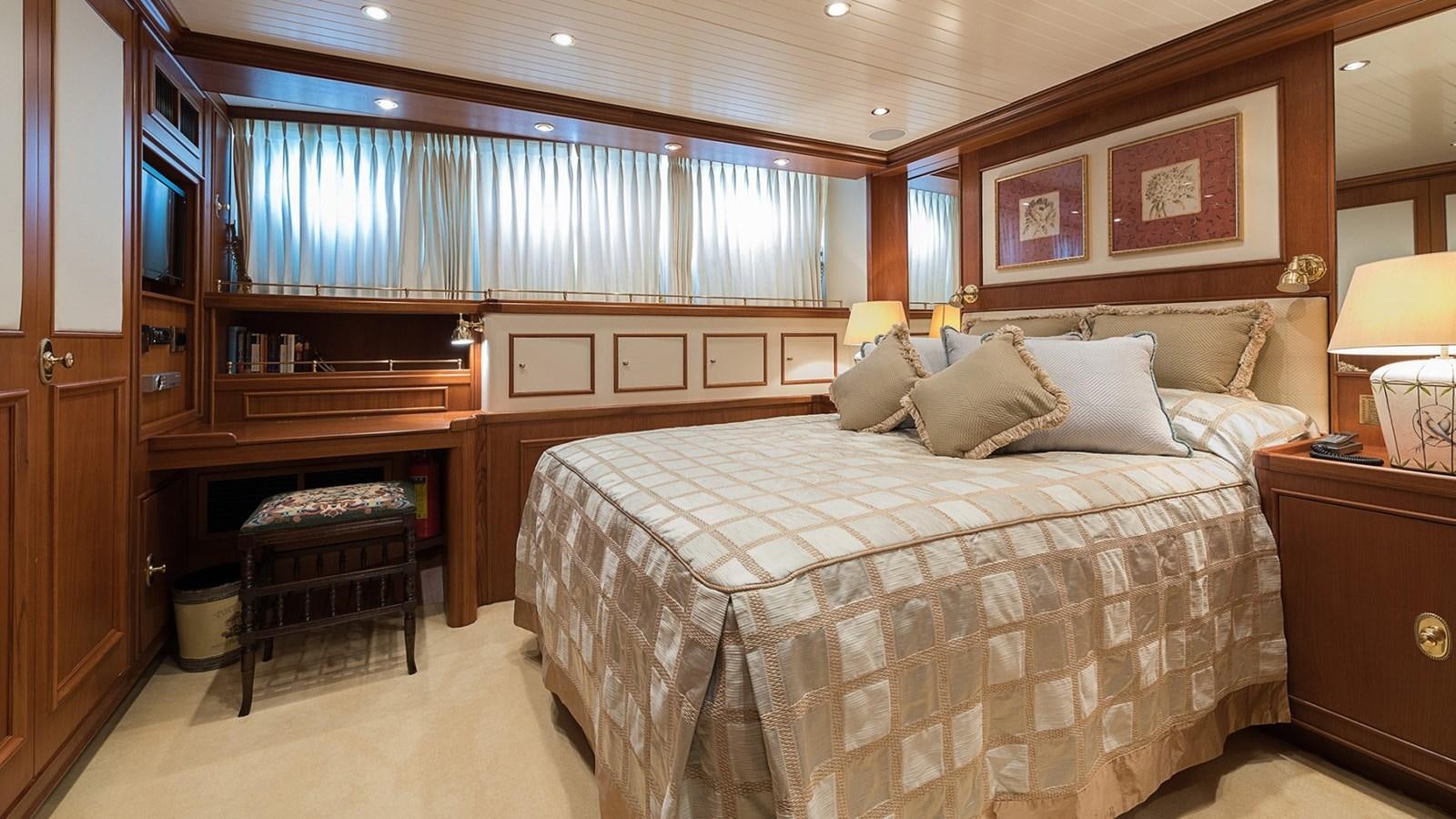 a large bedroom with a bed aboard LA REINA DEL MAR Yacht for Sale
