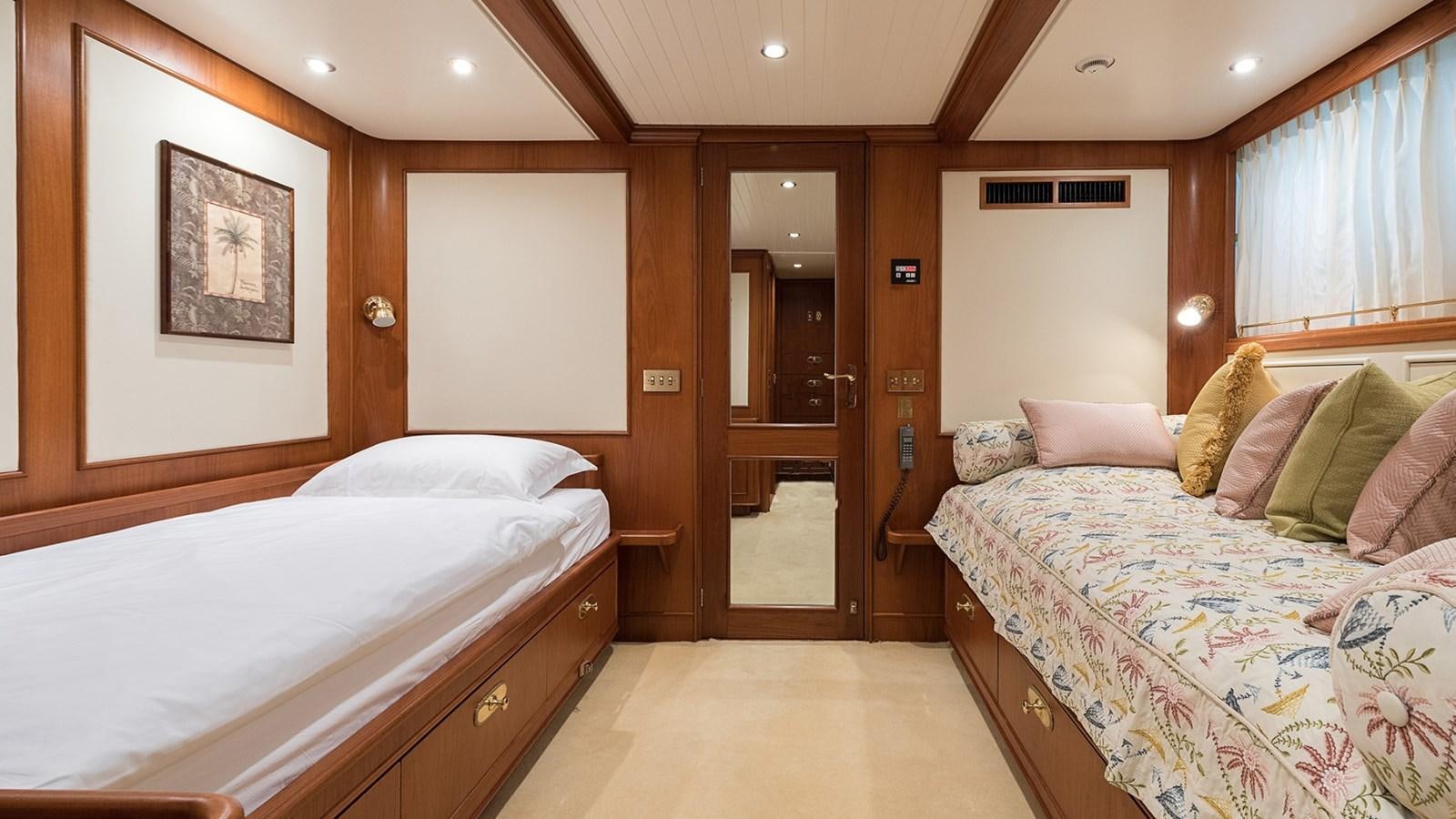 a room with two beds aboard LA REINA DEL MAR Yacht for Sale