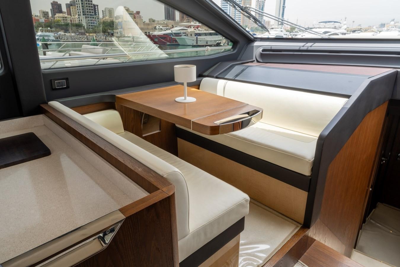 a table with a glass on it aboard TK Yacht for Sale