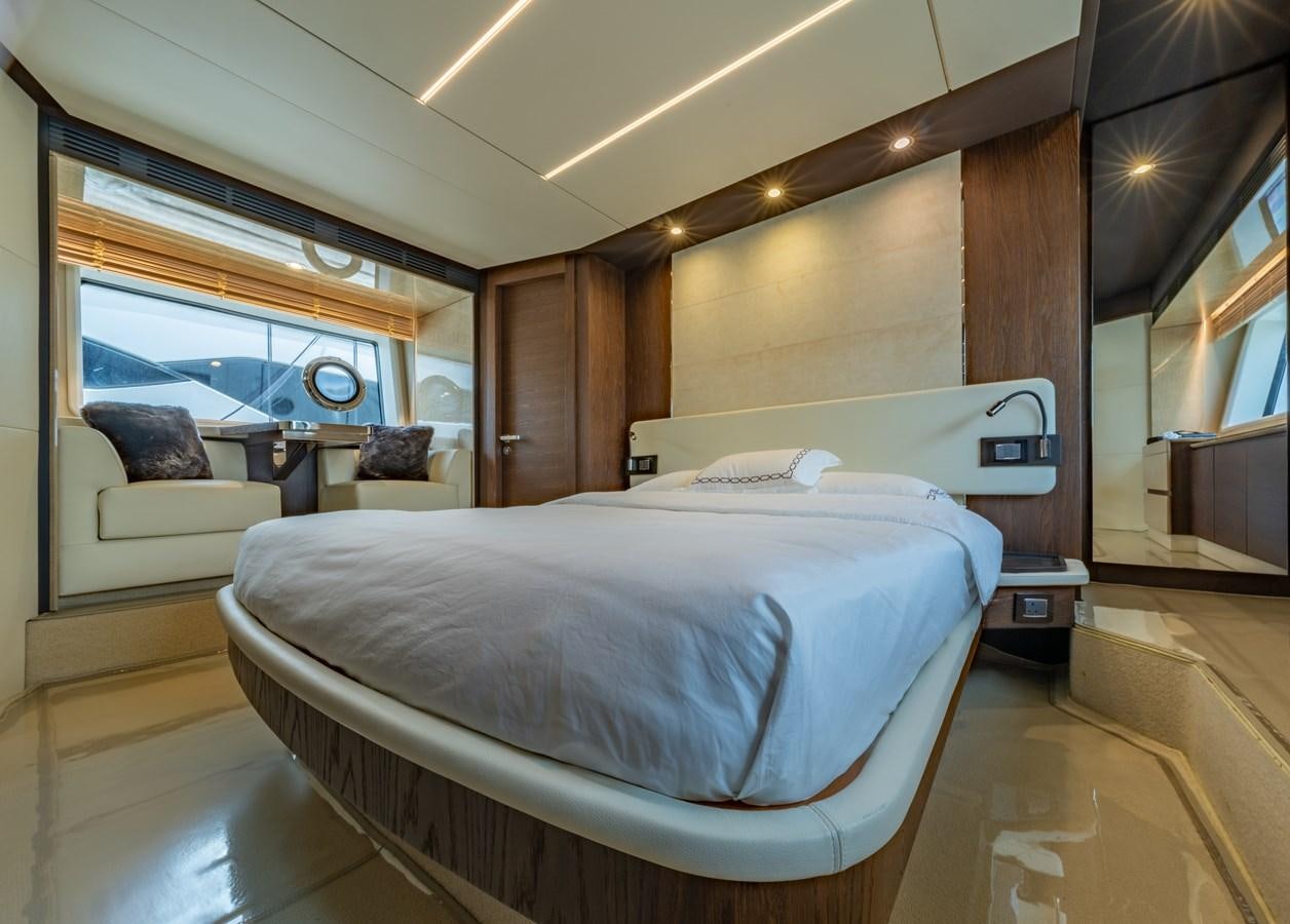 a bed in a room aboard TK Yacht for Sale