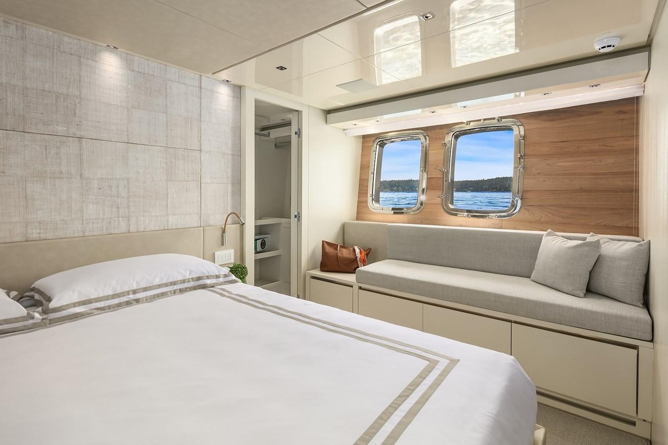 a room with a bed and a couch aboard SANLORENZO SX88/81 Yacht for Sale