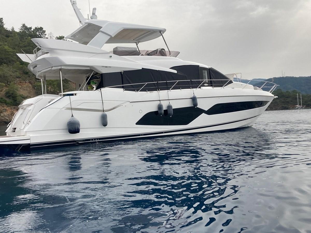 a white yacht on the water aboard CENGIZ Yacht for Sale