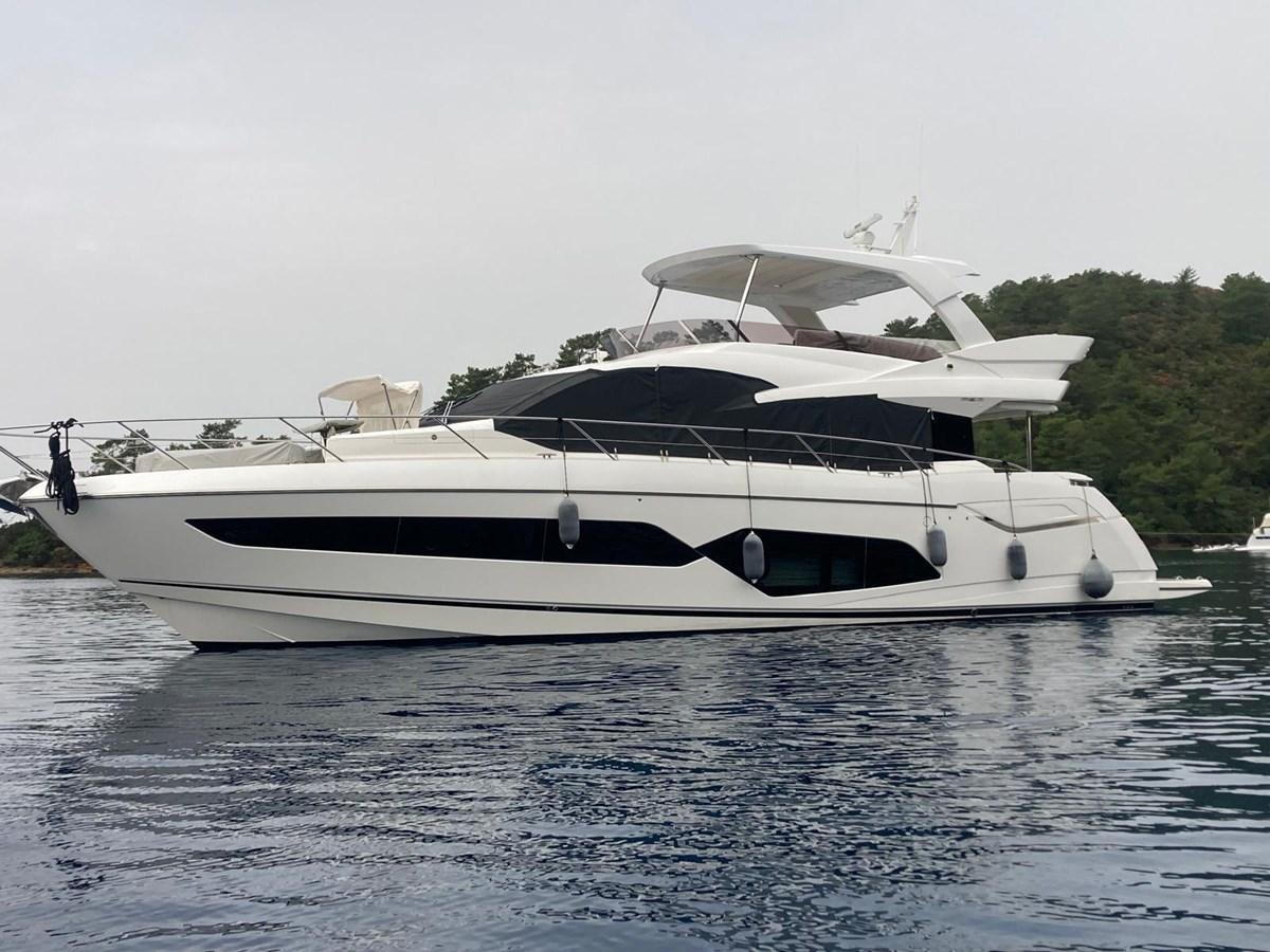 a white yacht on the water aboard CENGIZ Yacht for Sale