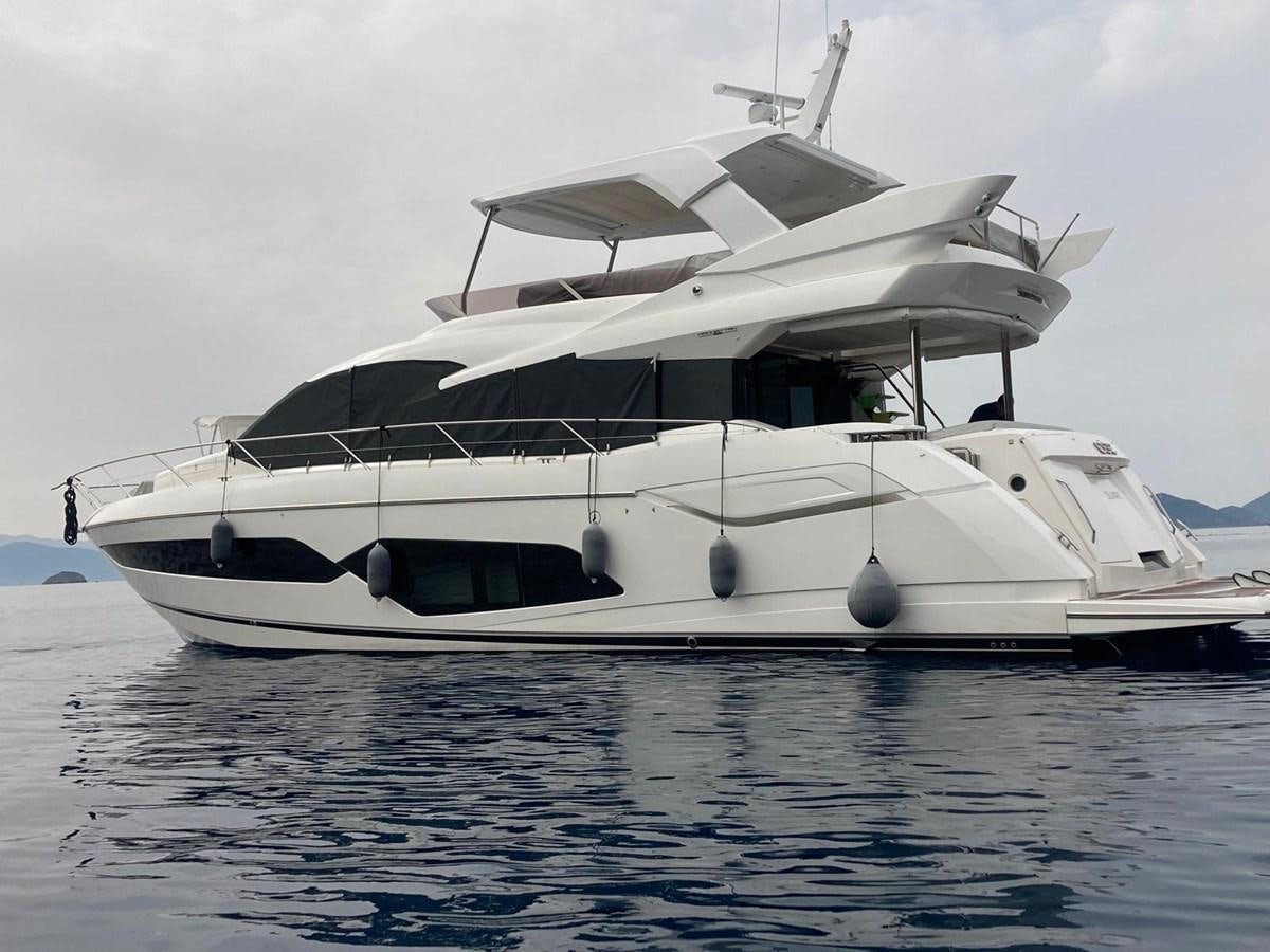 a white yacht on the water aboard CENGIZ Yacht for Sale