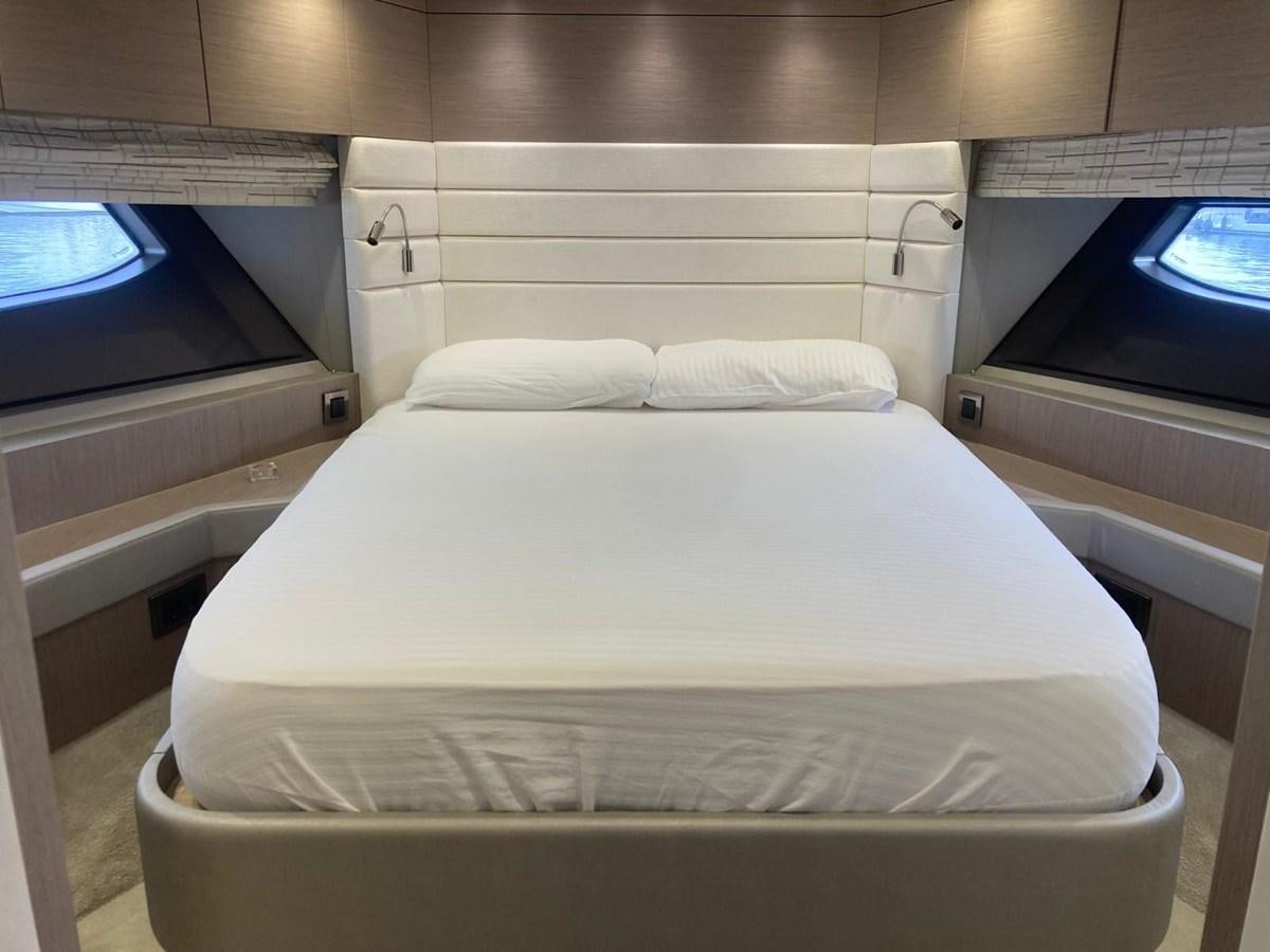 a white bed in a room aboard CENGIZ Yacht for Sale