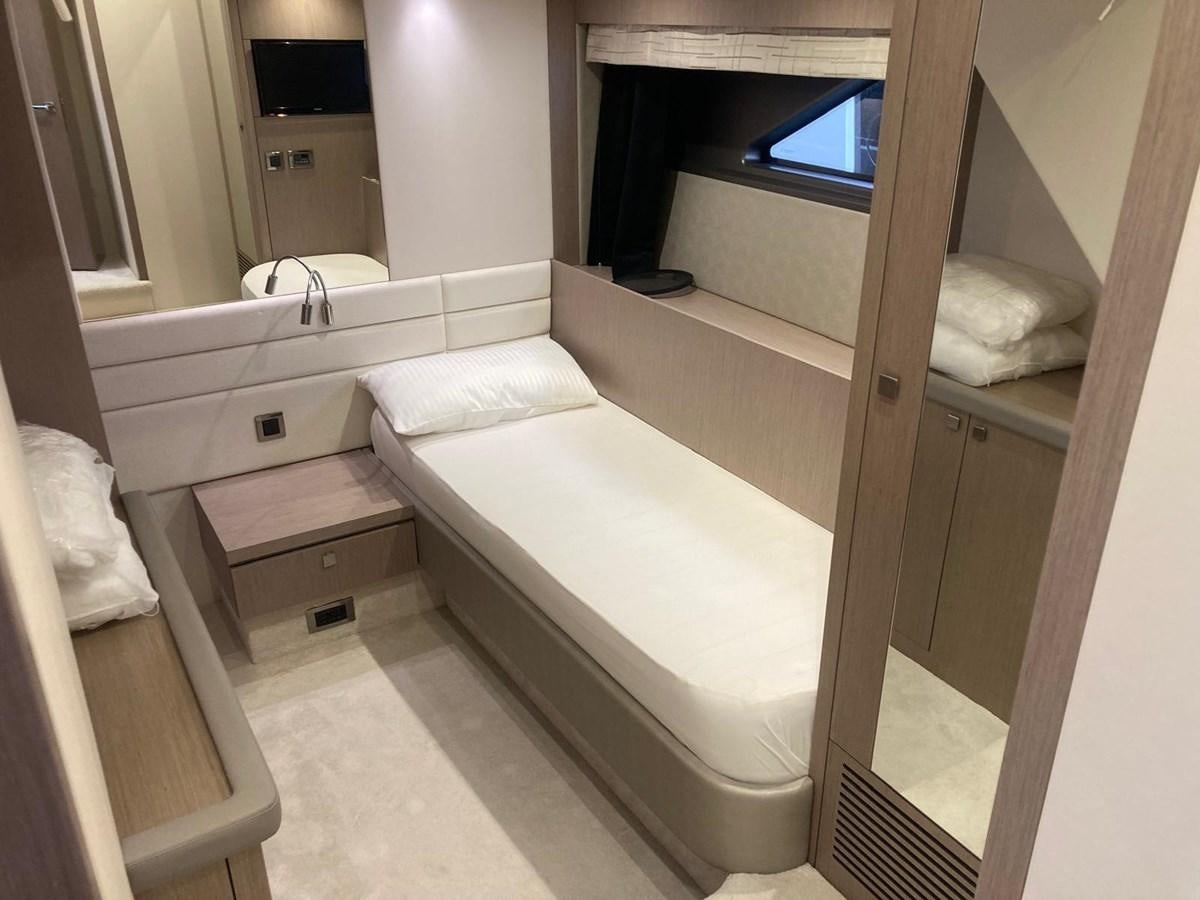 a room with a bed and a window aboard CENGIZ Yacht for Sale