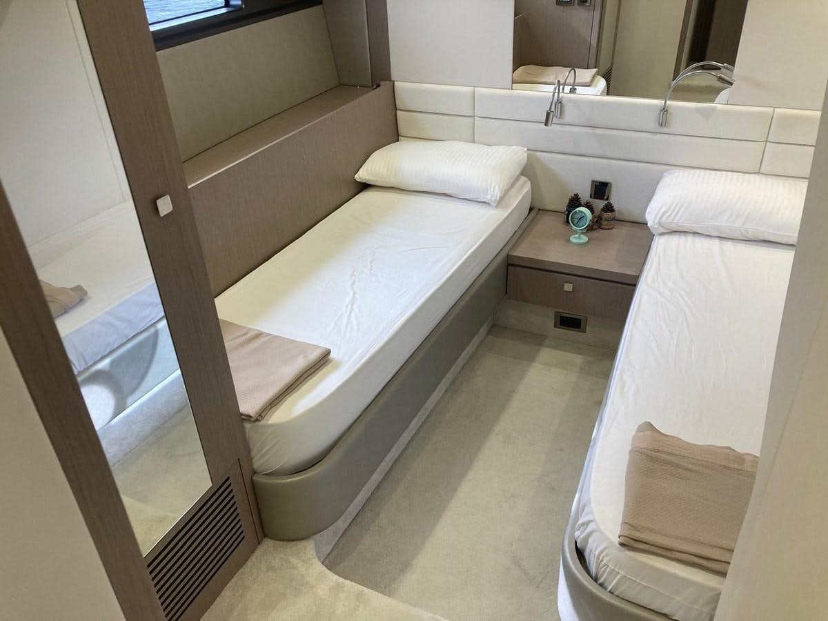 a bed with a white sheet aboard CENGIZ Yacht for Sale