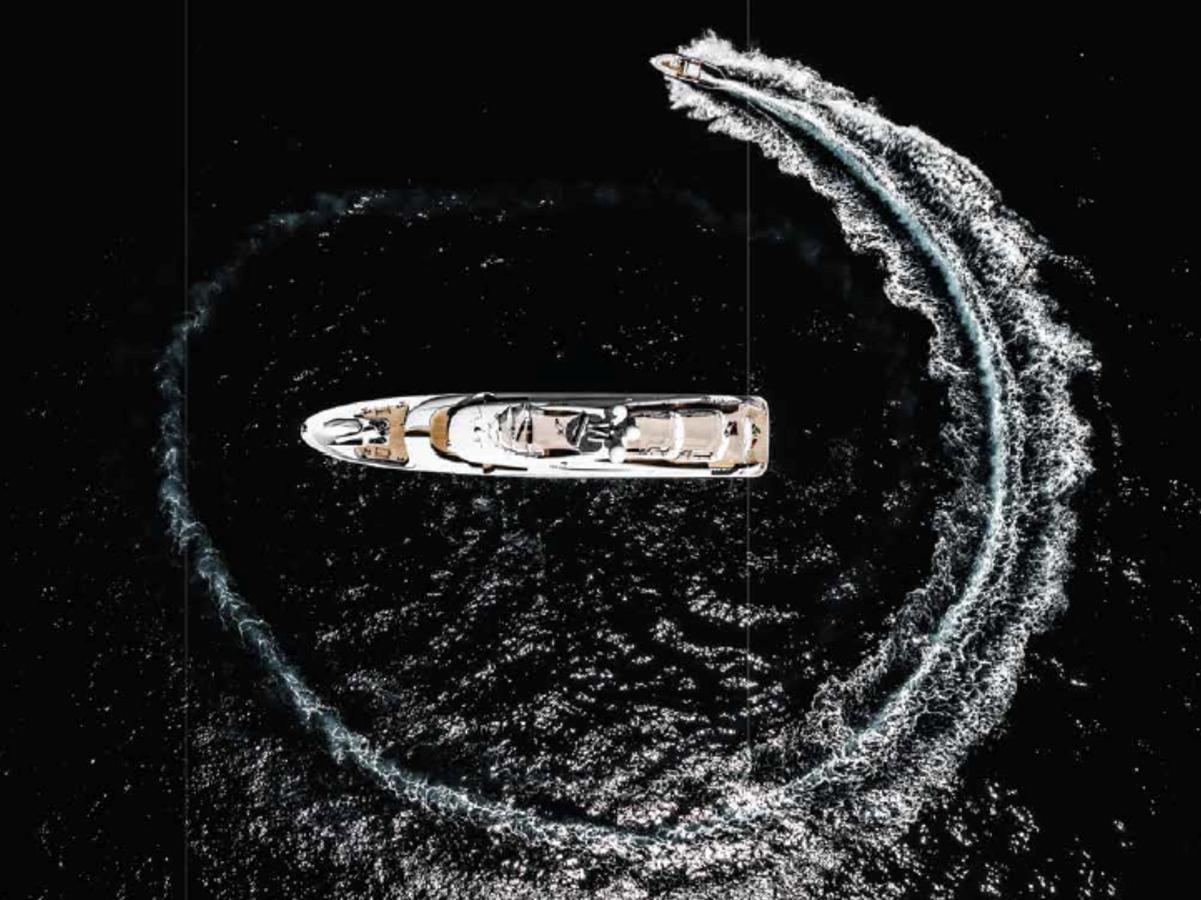 a close-up of a silver ring on a black background aboard ALI BABA Yacht for Sale