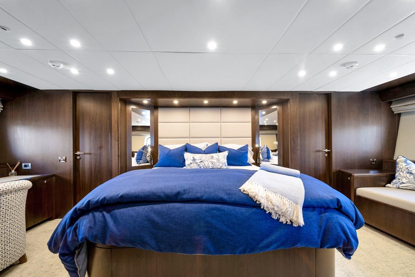 a bedroom with a large bed aboard MOONEN ROYAL DENSHIP 120 Yacht for Sale