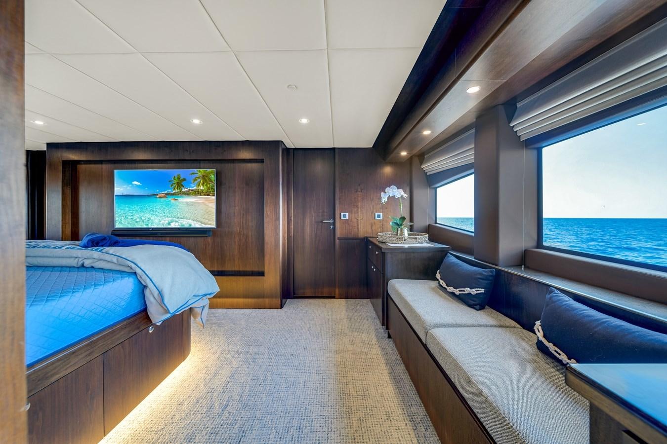 a room with two beds aboard MOONEN ROYAL DENSHIP 120 Yacht for Sale