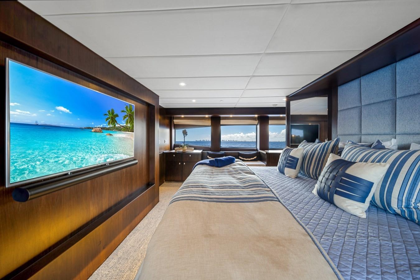 a large bed in a room aboard MOONEN ROYAL DENSHIP 120 Yacht for Sale