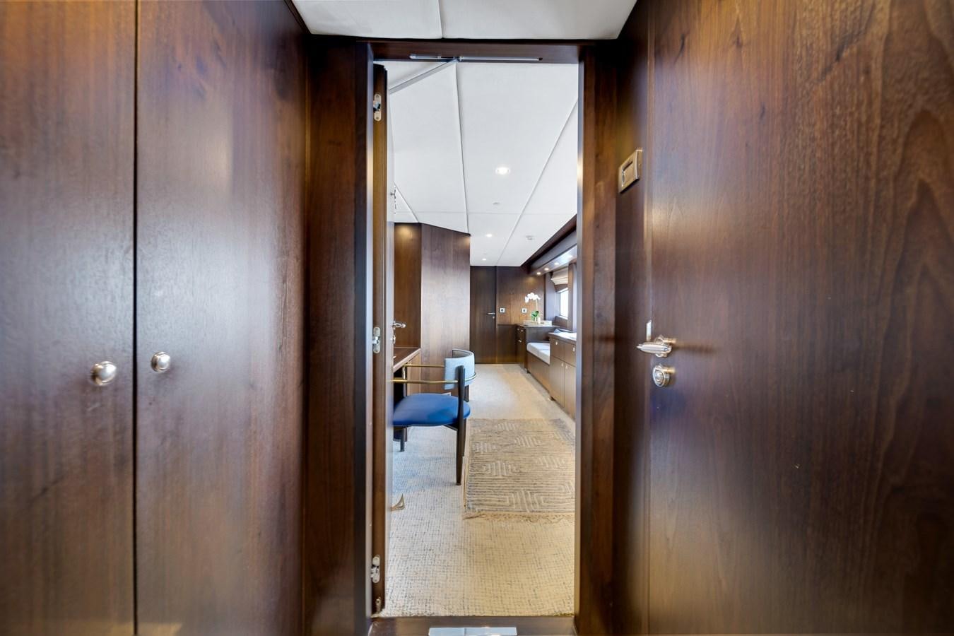 a hallway with wood doors aboard MOONEN ROYAL DENSHIP 120 Yacht for Sale