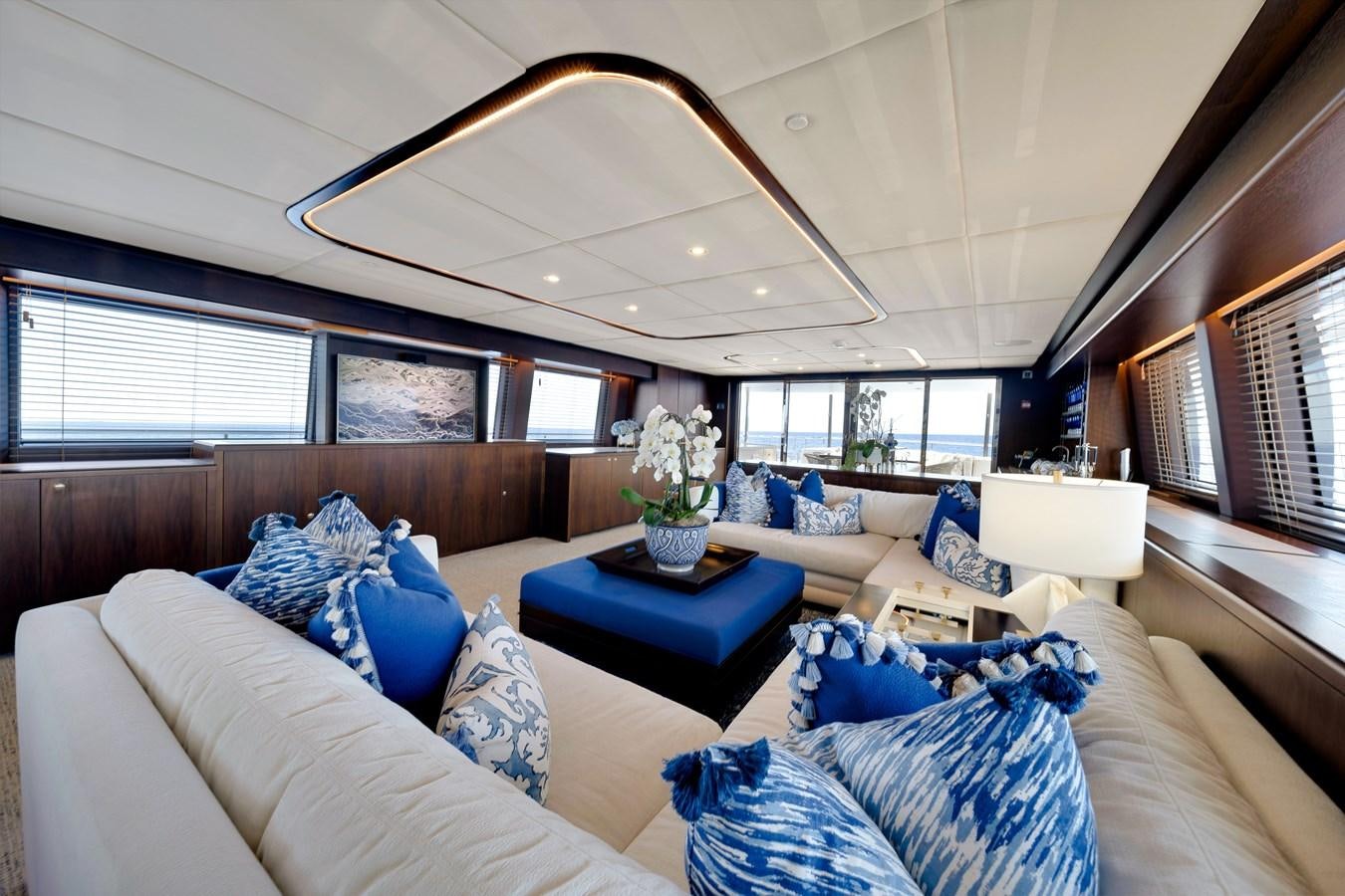 a living room with a large ceiling aboard MOONEN ROYAL DENSHIP 120 Yacht for Sale