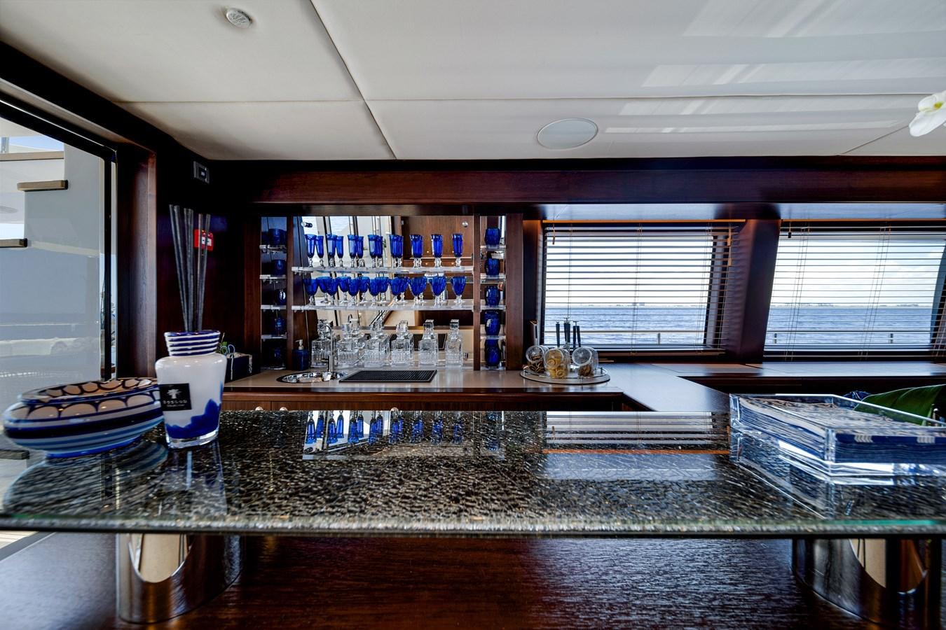 a large kitchen with a large counter aboard MOONEN ROYAL DENSHIP 120 Yacht for Sale