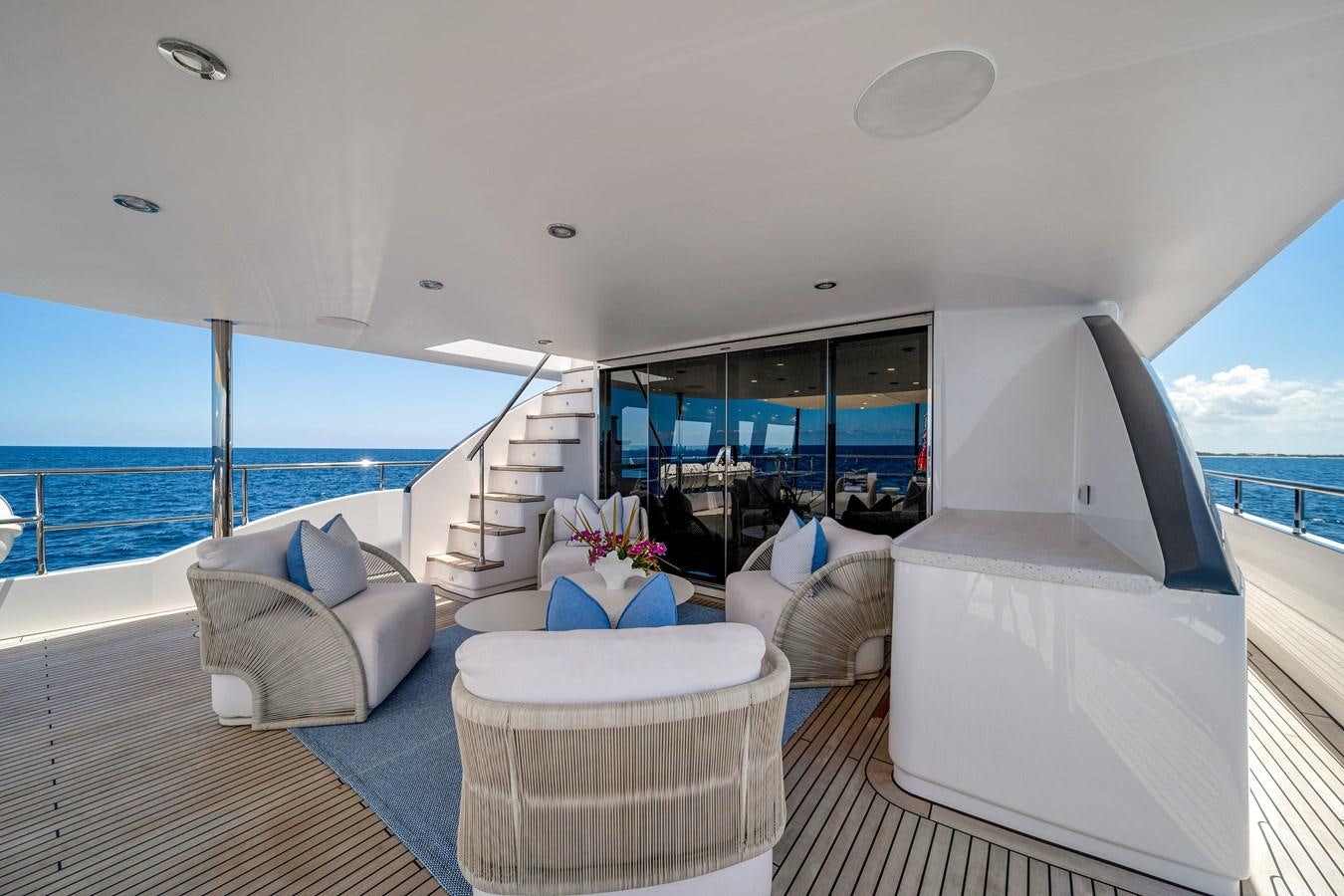 a living room with a large window aboard MOONEN ROYAL DENSHIP 120 Yacht for Sale