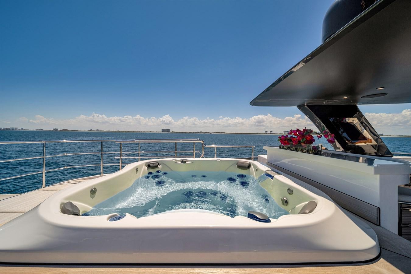 a boat with flowers on the water aboard MOONEN ROYAL DENSHIP 120 Yacht for Sale