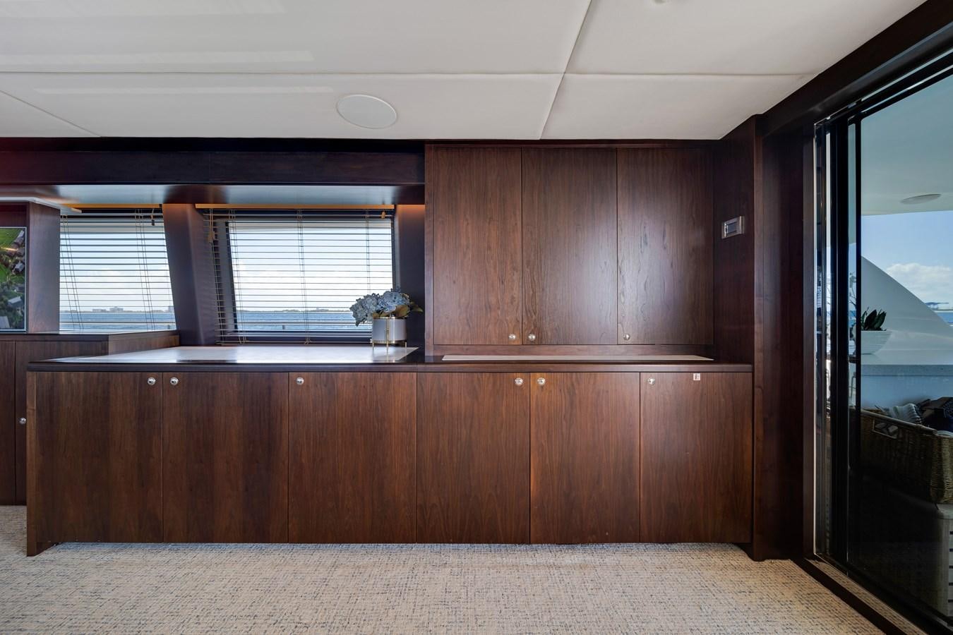 a room with a wood cabinet and a window aboard MOONEN ROYAL DENSHIP 120 Yacht for Sale