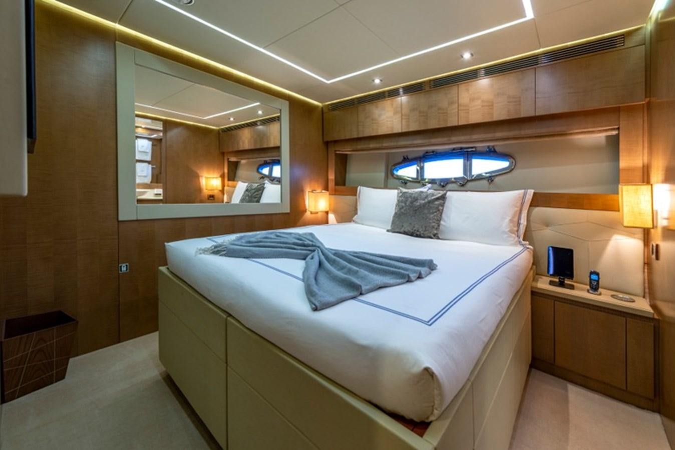 a hotel room with a large bed aboard LEVANTINE II Yacht for Sale