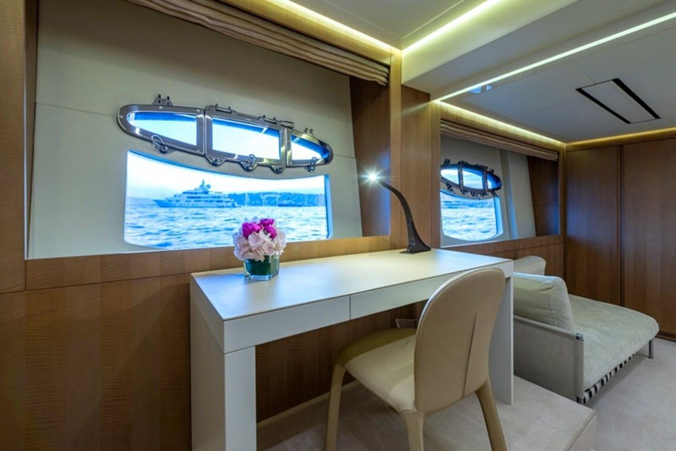 a room with a table and chairs aboard LEVANTINE II Yacht for Sale