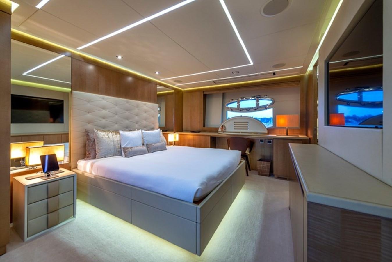 a room with a bed and a tv aboard LEVANTINE II Yacht for Sale