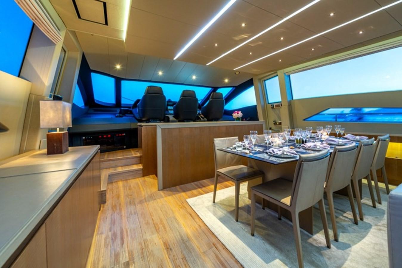 a room with a table and chairs aboard LEVANTINE II Yacht for Sale
