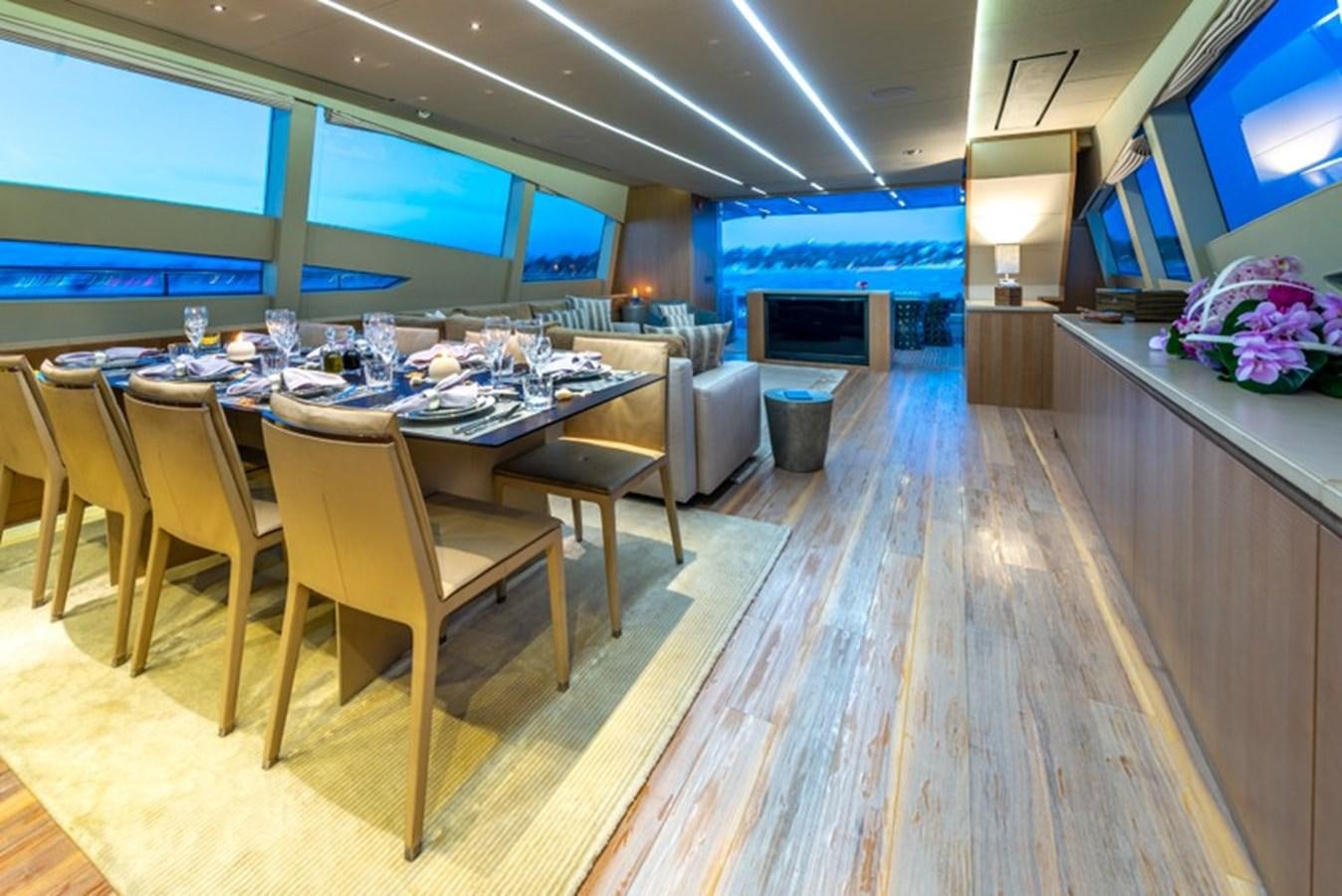 a room with a table and chairs aboard LEVANTINE II Yacht for Sale