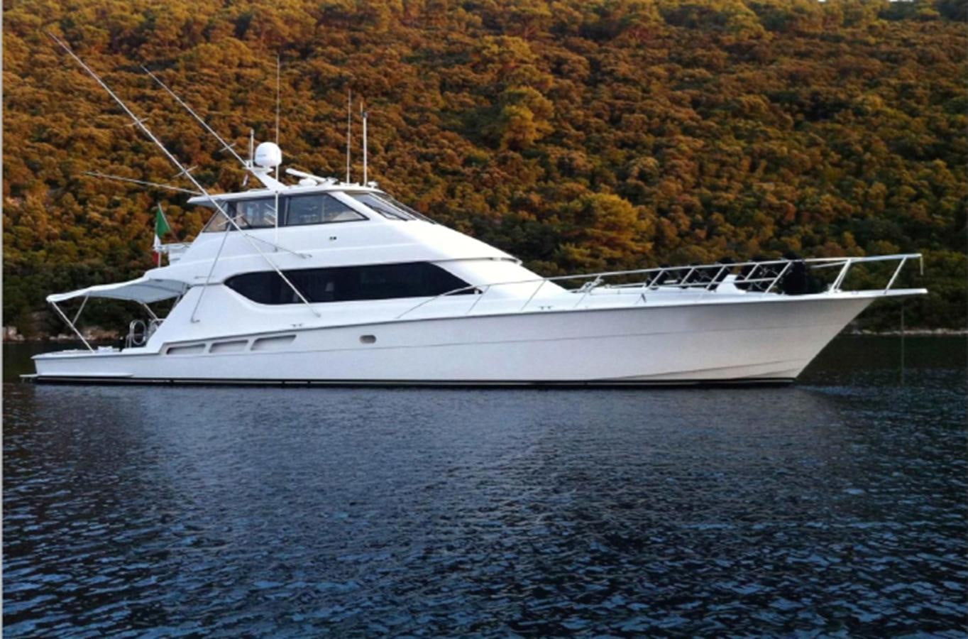 a white yacht on the water aboard MAKAIRA Yacht for Sale