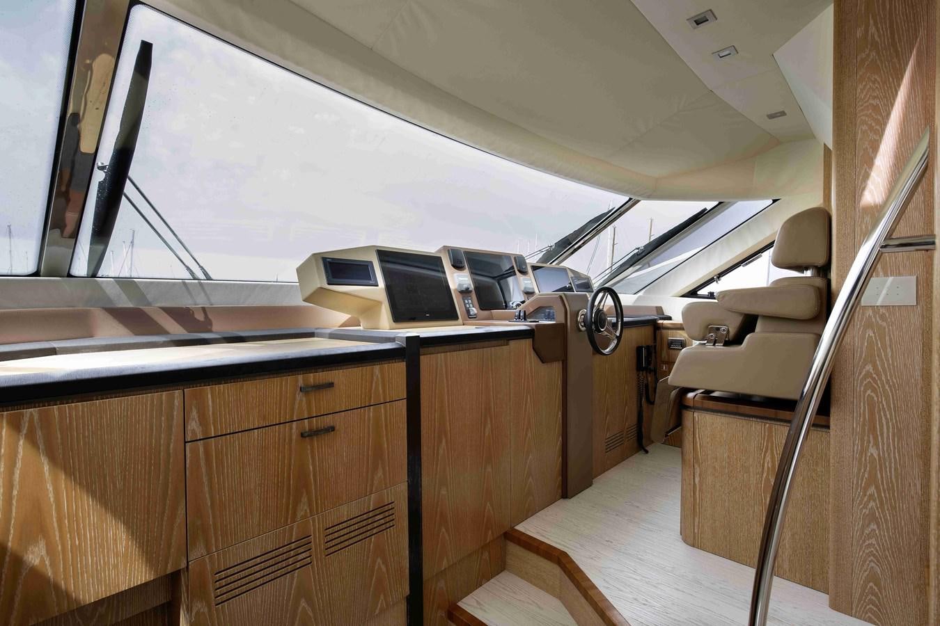 a room with a desk and a laptop on a table aboard ANDIAMO Yacht for Sale