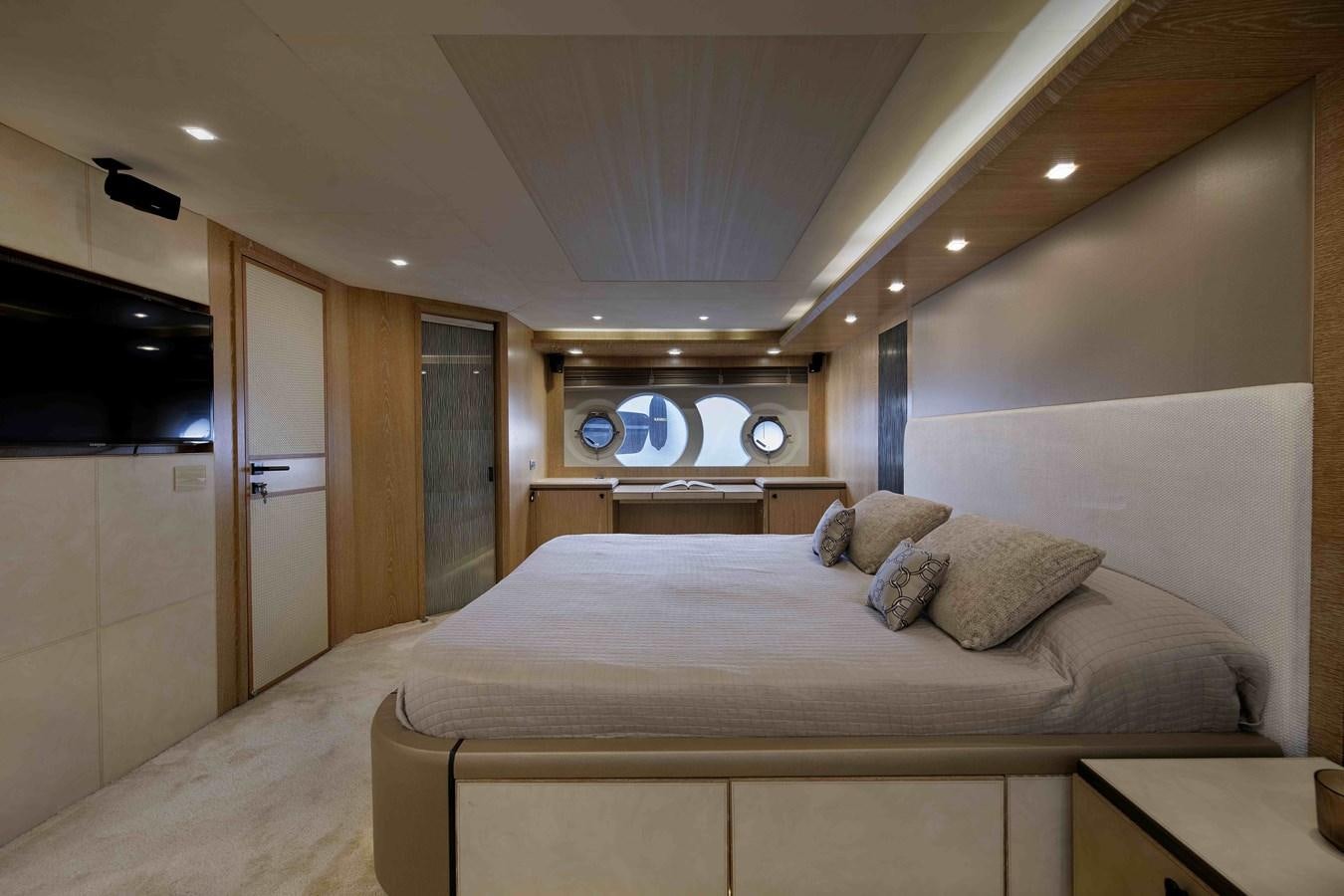 a bed in a room aboard ANDIAMO Yacht for Sale