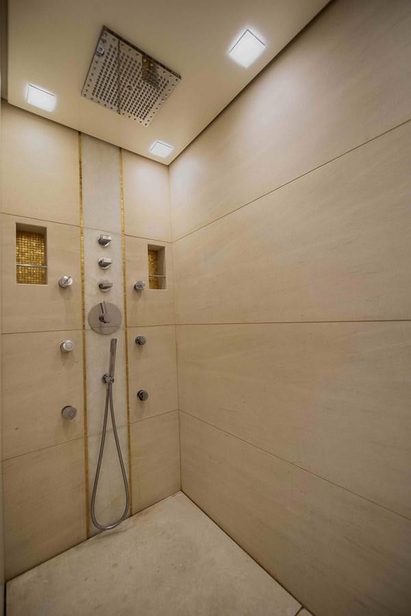 a bathroom with a shower unit aboard ANDIAMO Yacht for Sale
