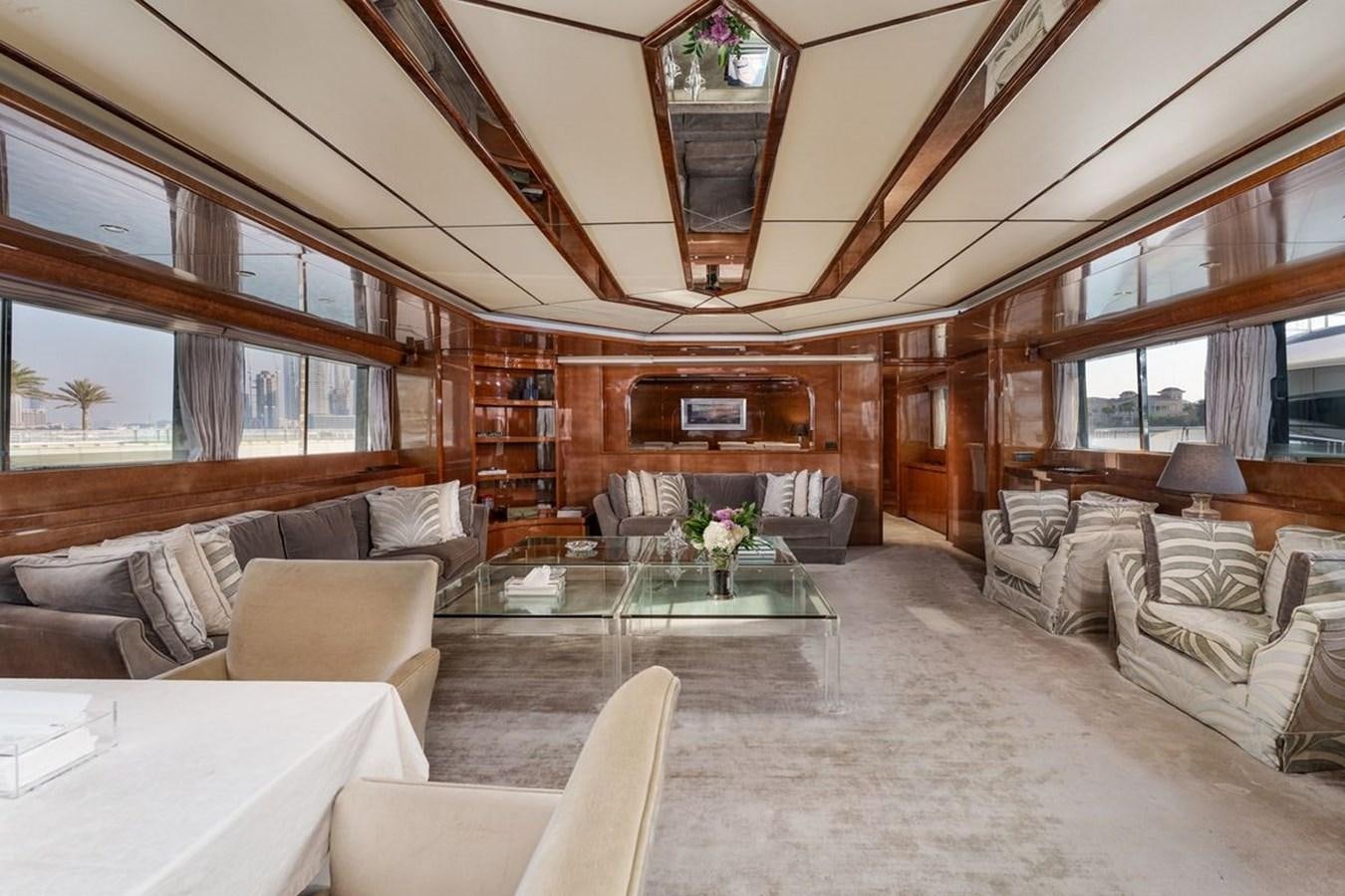 a living room with a large window aboard ALIA 7 Yacht for Sale